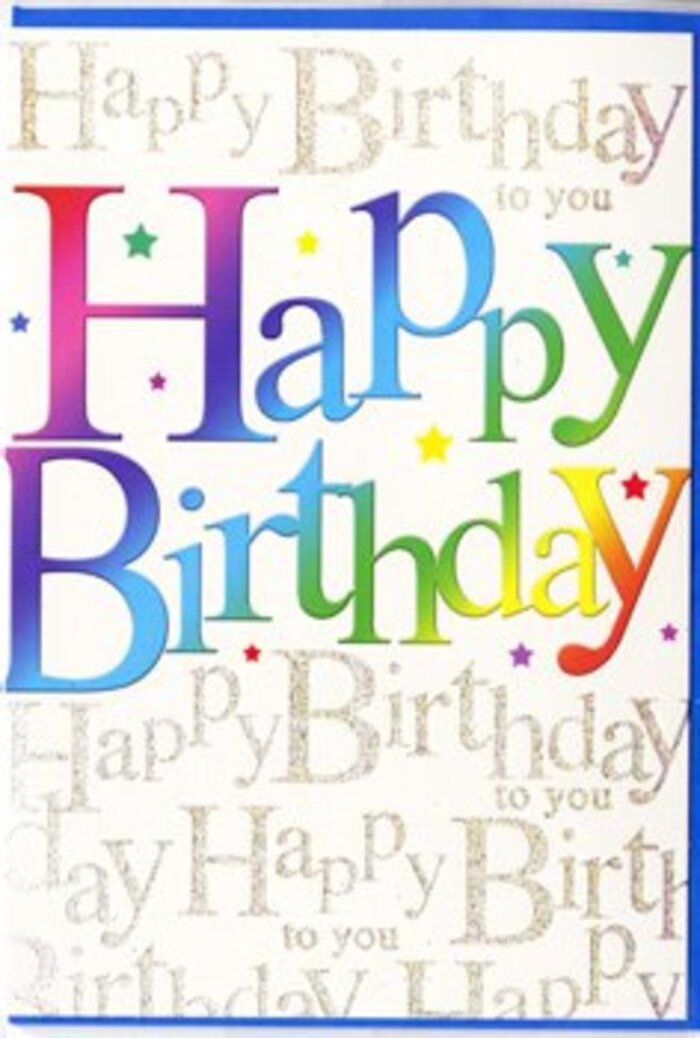 The birthday card shown feels like a joyful burst of colour set against a calm, neutral backdrop, much like discovering a lively pocket of celebration tucked into a quiet White City side street. The centre of the design is occupied by the words Happy Birthday, rendered in large, rounded letters that seem almost cushioned, as if they might be slightly raised to the touch. Each letter is filled with a cascading gradient of colour-deep cherry red at one edge, softening through apricot, brilliant yellow, and fresh spring green, then cooling into turquoise, royal blue, and a plush twilight purple. These hues meet and blend at their borders, recalling the smooth transitions in a carefully arranged birthday bouquet displayed near Westfield or the green spaces around White City. Framing and supporting these rainbow letters, the entire background of the card is covered in delicate lines of golden handwriting, repeating Happy Birthday to you in a looping, cursive style from margin to margin. The gold ink appears gently glittered, providing small, sparkling highlights that dance across the surface like late afternoon light catching on glass balconies along Wood Lane. This repeating script creates a soft, musical rhythm, like a quiet chorus behind the main statement. Between the bold letters and the shimmering background, tiny decorative elements-minute stars, dots, and specks in complementary colours-are scattered like confetti, adding to the sense of motion and festivity. The finish of the card appears smooth and slightly glossy, enhancing both the richness of the colour gradients and the glimmer of the metallic script. It feels like a thoughtfully designed birthday card you might find chosen by a local White City florist, ready to accompany a fresh arrangement for delivery to apartments, family homes, and creative studios across the area.