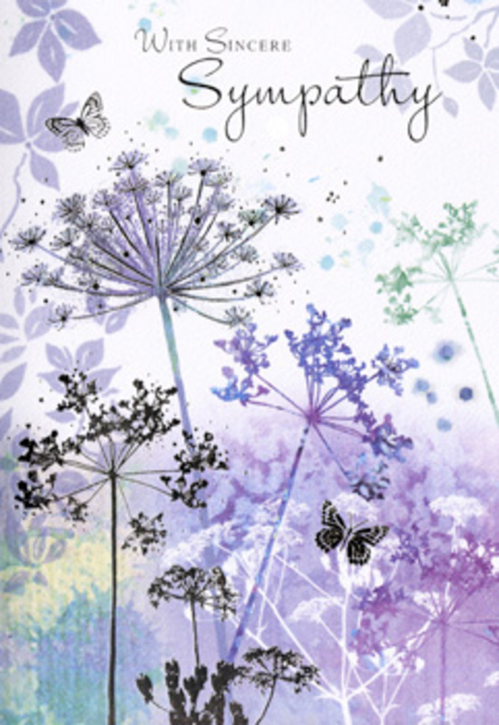 There is a tranquil, contemplative beauty in this sympathy card's design, as if capturing the hush of White City before the day fully begins. Tall, slender wildflower stems, drawn with fine, almost calligraphic lines, arch gracefully upward from the lower edge of the card. Their filigree umbel heads form delicate, circular sprays, each made up of countless tiny blossoms hinted at with dots and dashes of paint in soft violet, powder blue, and cool lilac. Behind them, the background dissolves into softly blurred washes of colour, blending lavender, blue-grey, and a whisper of sage green, like distant trees seen through morning mist. The effect is reminiscent of dewy fields near Wood Lane when the world still feels quiet and thoughtful. Two butterflies hover above the wispy petals, rendered in light, translucent tones that allow the underlying colours to show through, creating a sense of hope and gentle continuity even in sorrow. The lighting is diffuse, with no sharp shadows, wrapping the composition in a calm, enveloping glow. Space is thoughtfully left between stems and blooms, inviting the eye-and the heart-to pause. As a florist serving families in and around White City, I recognise this same tender restraint in the sympathy tributes we design: honest, soothing, and never overpowering. The card offers more than a printed message; it feels like an invitation to sit quietly with one's memories, to breathe deeply, and to remember with love, making it a dignified and compassionate choice for conveying condolences.